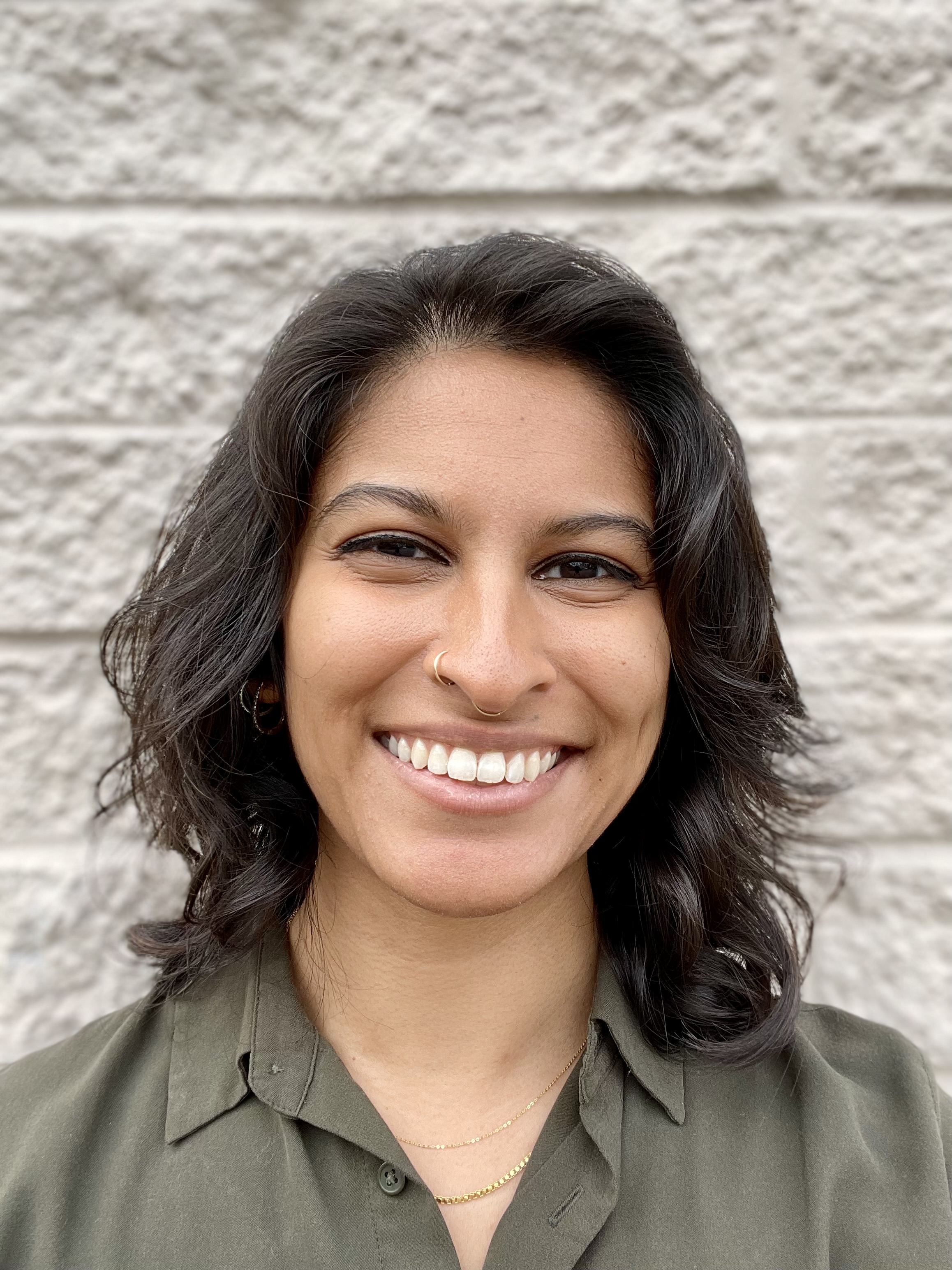 Headshot of Dharani Persaud